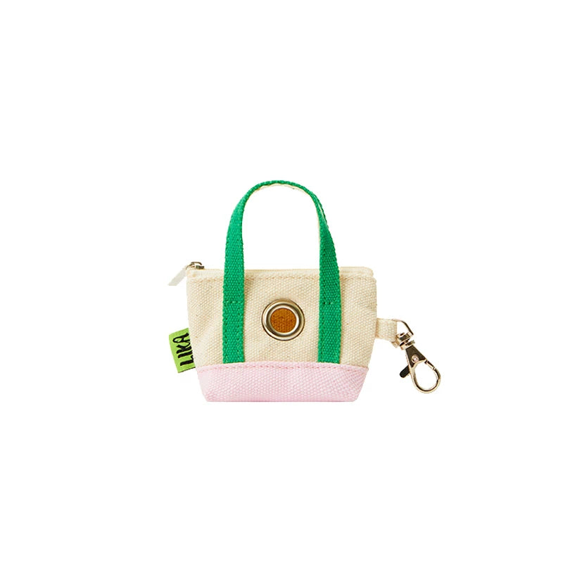 LIKAPAWS Reisetasche aus Canvas für Katzen- und Hundebedarf mit farblich abgesetztem Design und schräger Öffnung.